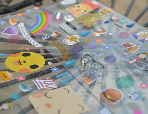 Teen blogger Nyah Marie AKA Style Stalker shows you how she creates this '90s inspired sticker clutch in a DIY post. Click to read more on how to create this quirky statement bag.